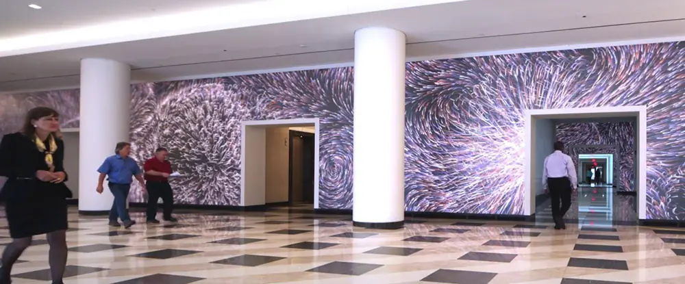 Motion-activated media architecture uses digital activations to reflect the movement of humans in an environment.