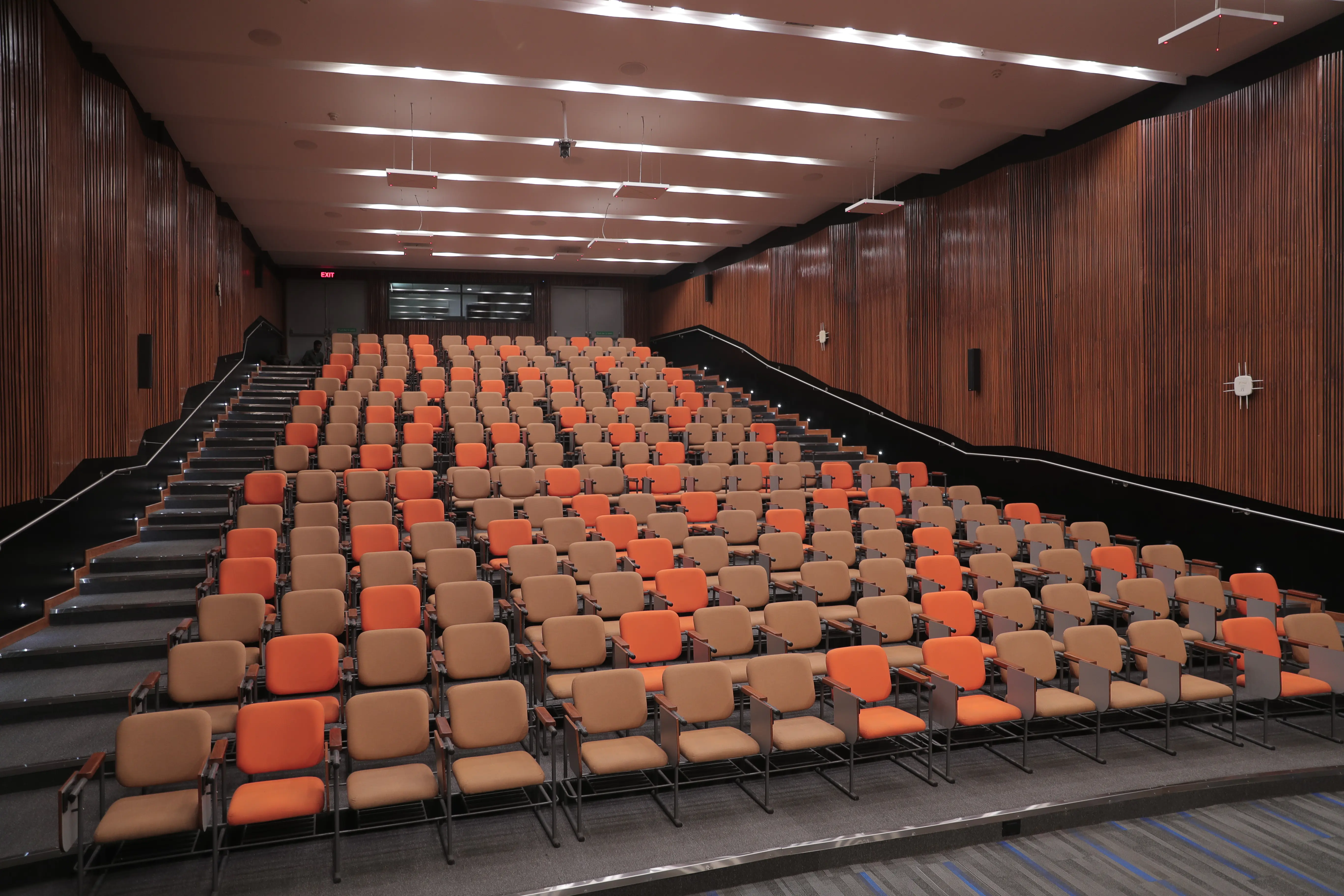 Integrated voice-lift systems with ceiling tile microphones at Ahmedabad University
